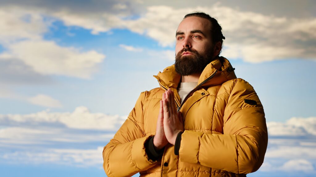 Calm peaceful explorer doing meditation session for stress relief in nature1